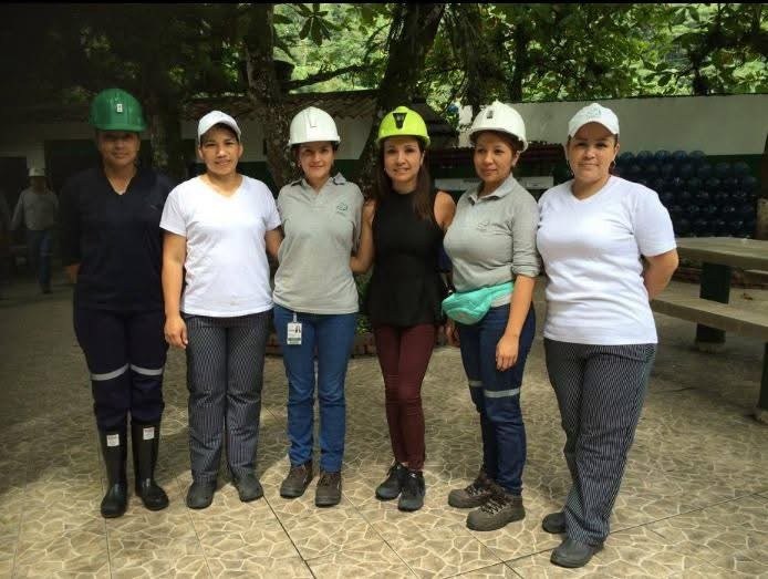 With women workers at the Minería Texas Colombia emerald mine, Muzo, Colombia